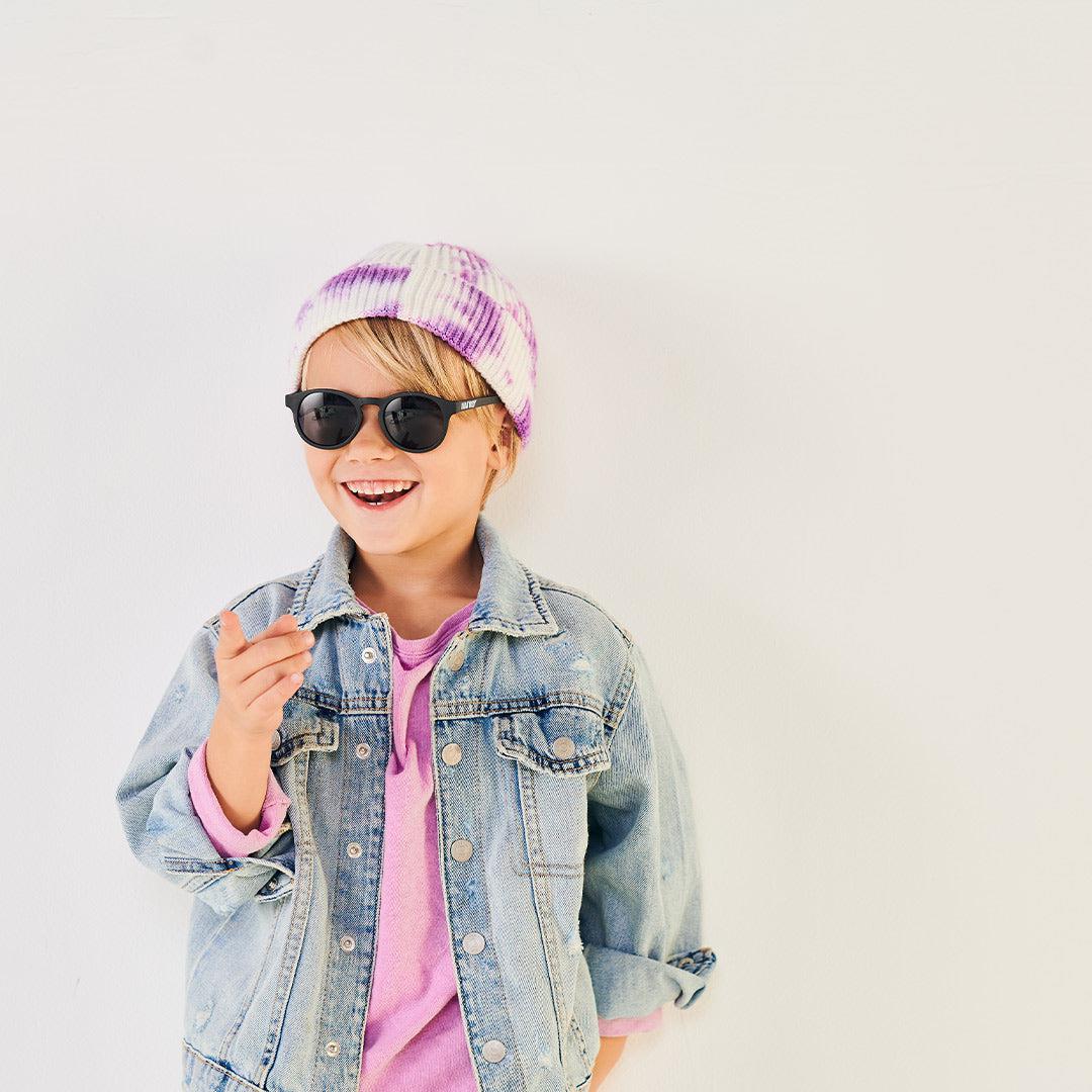 Babiators Polarised Keyhole Jet Black Smoke kids sunglasses worn outdoors