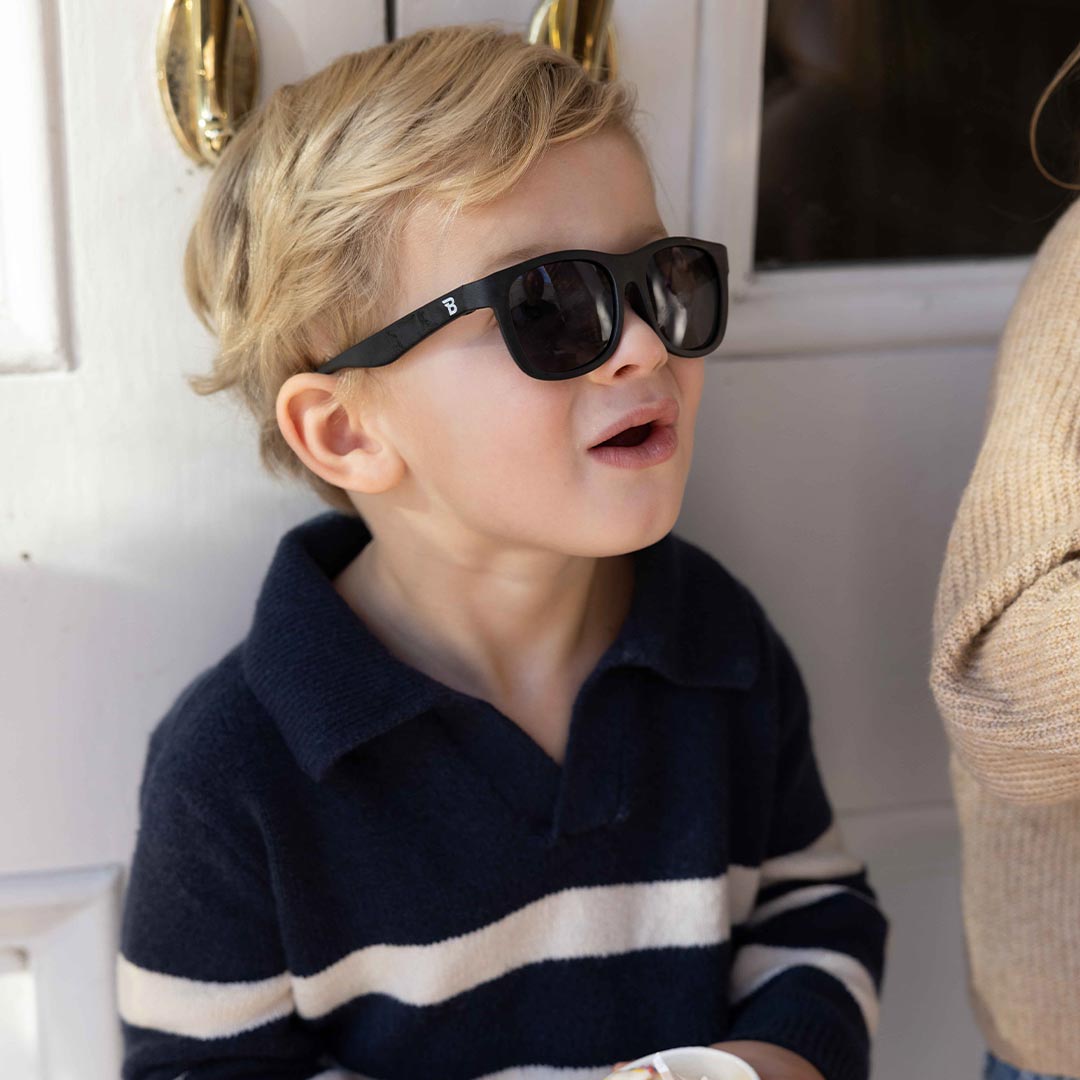 Babiators Original Navigator Jet Black kids sunglasses worn outdoors