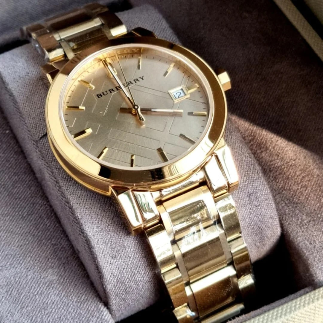 Burberry BU9033 The City gold bracelet and gold dial watch