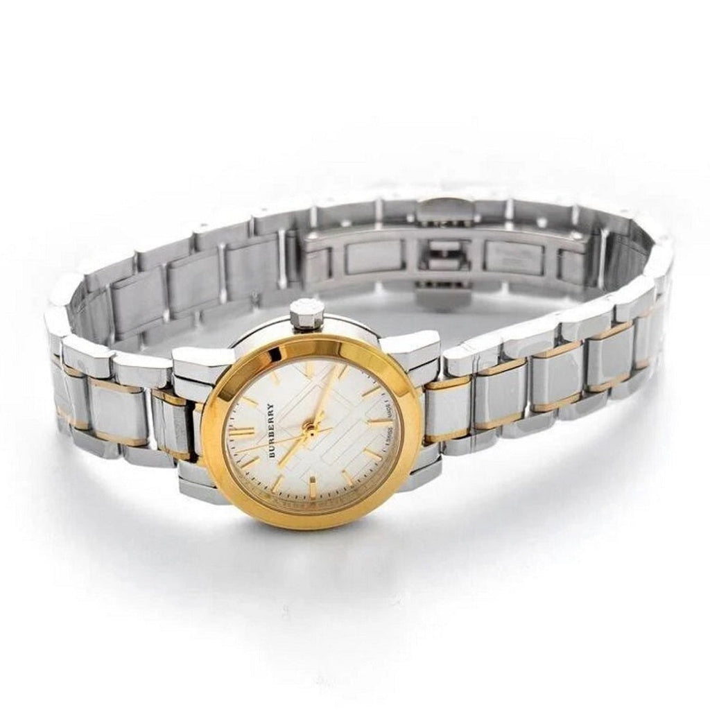 Burberry BU9217 two-tone watch flat lay with silver and gold bracelet