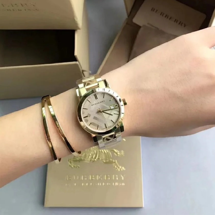 Burberry BU9033 gold watch on wrist