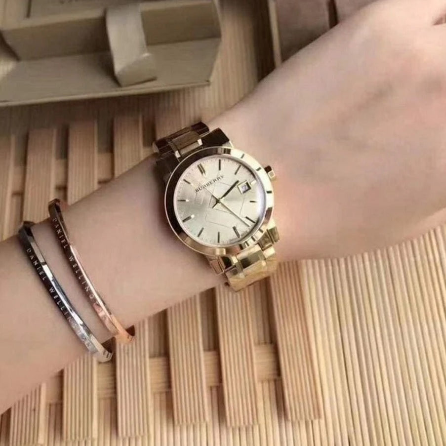 Burberry BU9134 gold watch on wrist
