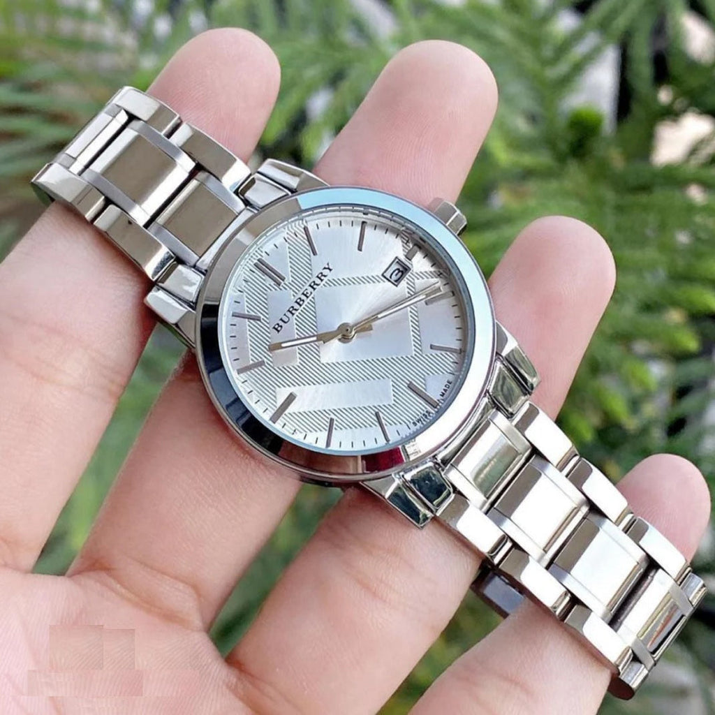Burberry BU9100 women’s watch held in hands