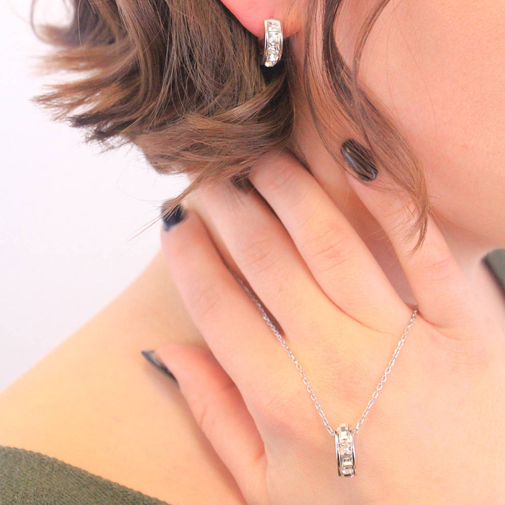 Silver crystal square hoop earrings angled view