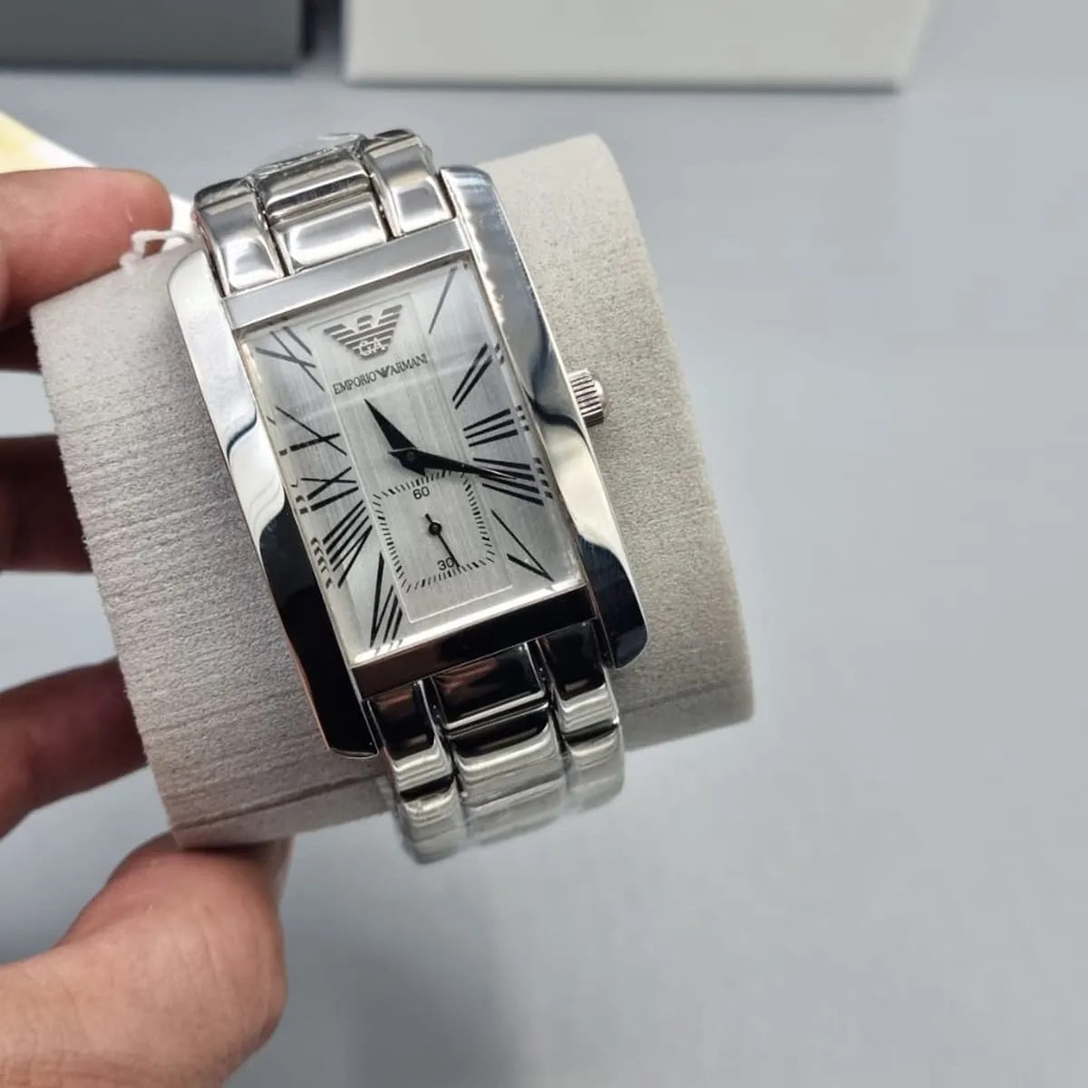 Emporio Armani AR0145 watch on display pillow