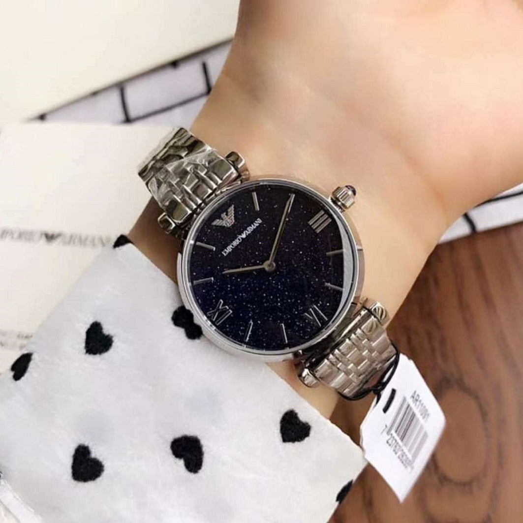 Emporio Armani AR11091 blue dial silver watch on wrist close-up