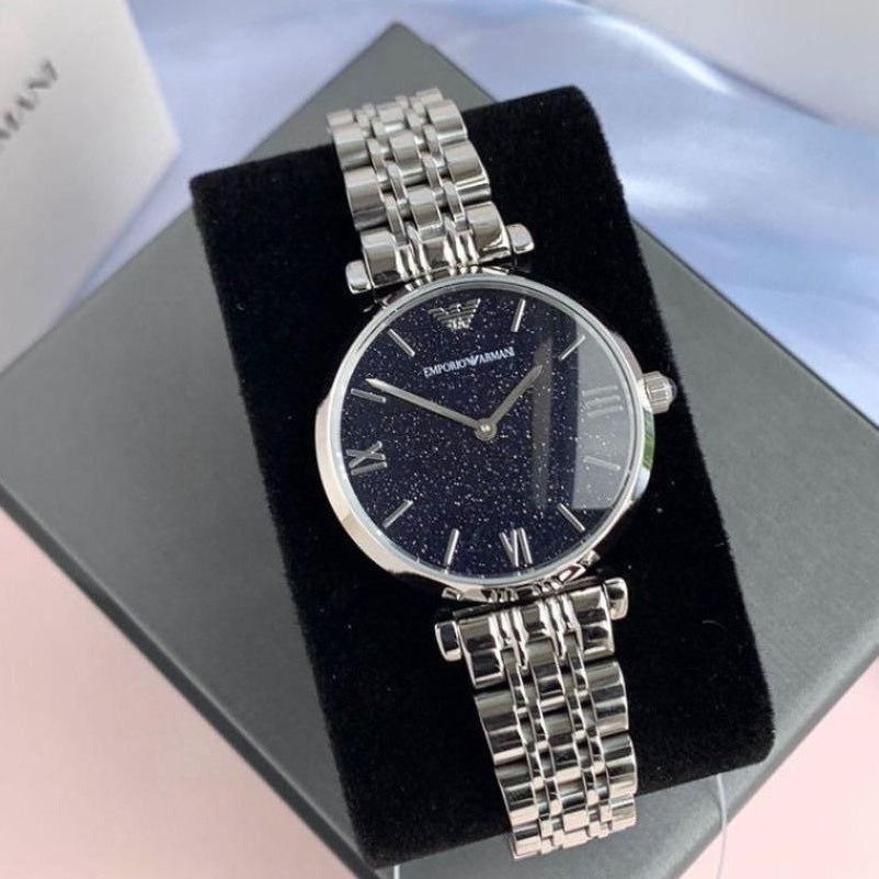 Emporio Armani AR11091 watch on branded pillow