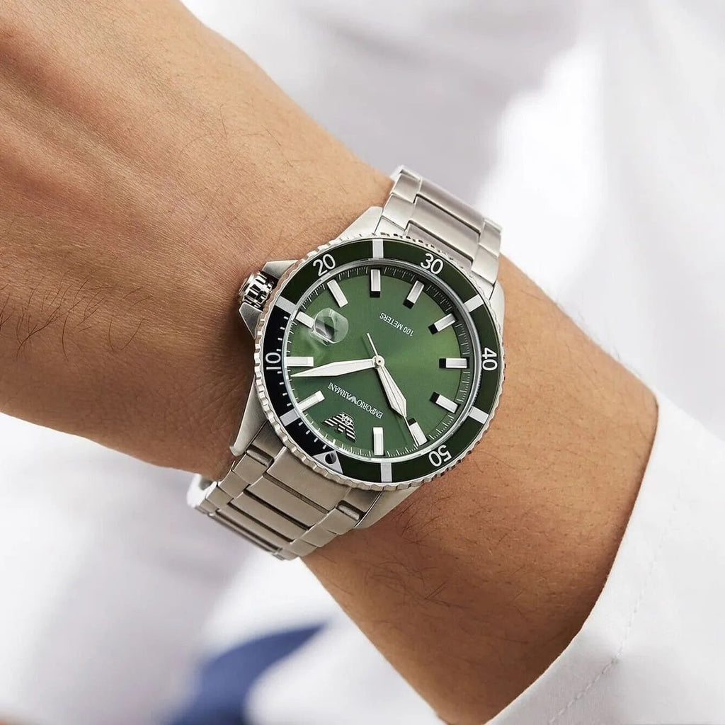 Emporio Armani AR11338 green dial watch close-up on wrist