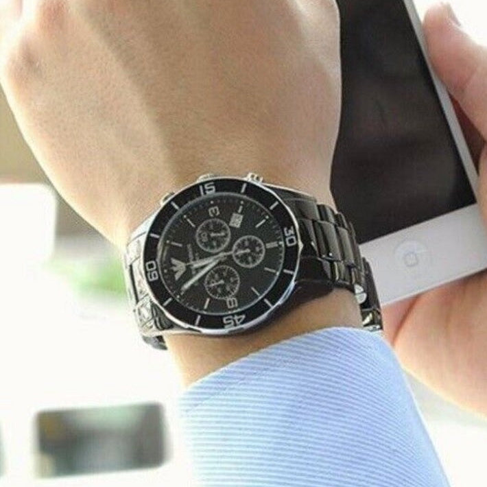 Emporio Armani AR1421 Leo black ceramic watch on wrist
