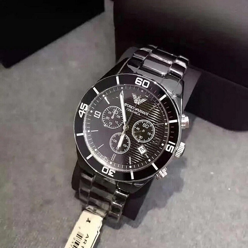 Emporio Armani AR1421 Leo watch on pillow with black ceramic bracelet and black dial