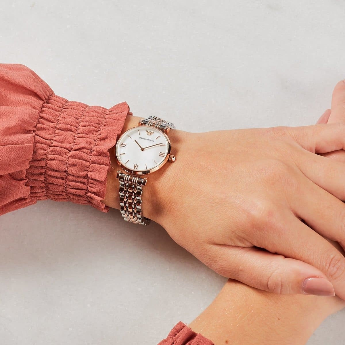 Emporio Armani AR1683 two-tone women’s watch on wrist