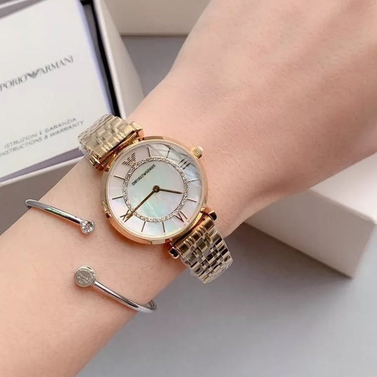 Emporio Armani AR1907 gold mother-of-pearl dial watch on wrist