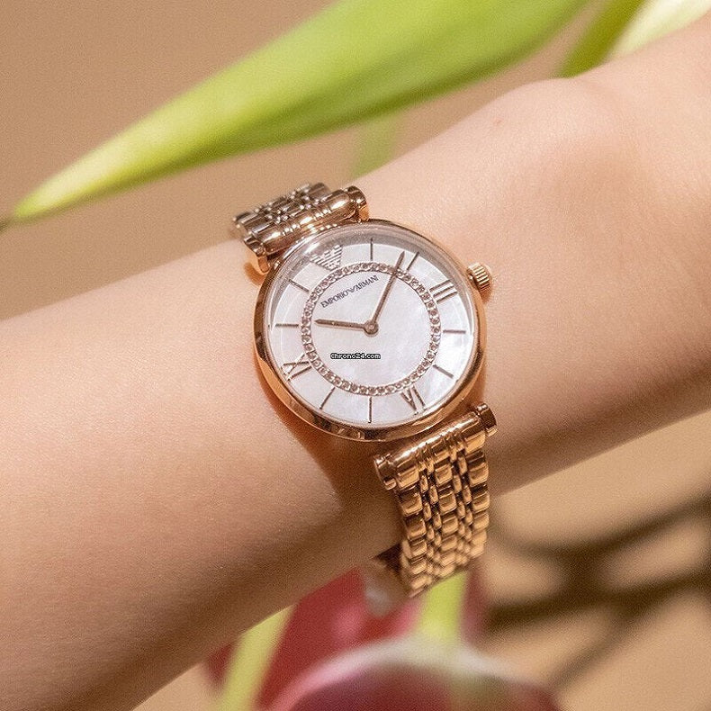 Emporio Armani AR1909 rose gold mother-of-pearl dial watch on wrist
