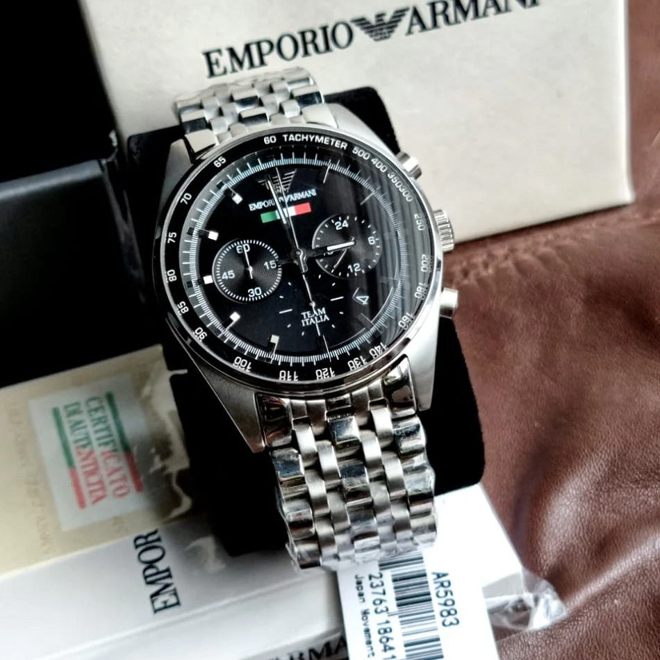 Emporio Armani AR5983 watch on branded pillow