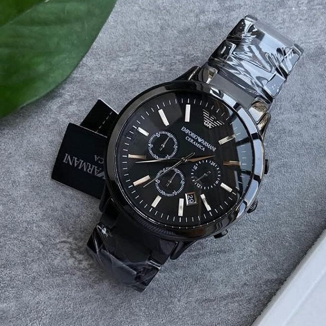 Emporio Armani men’s black ceramic watch dial close-up
