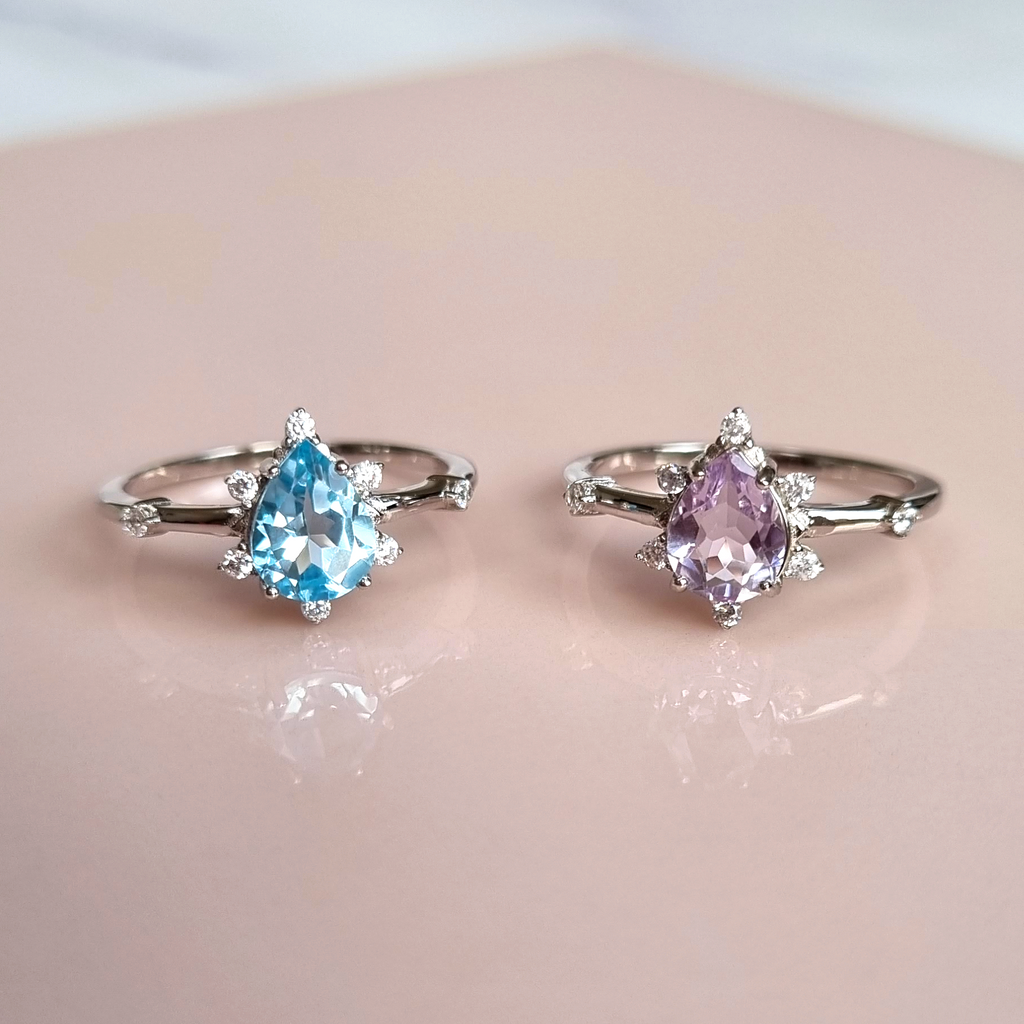 Estelle sky blue topaz and lavender amethyst rings group image