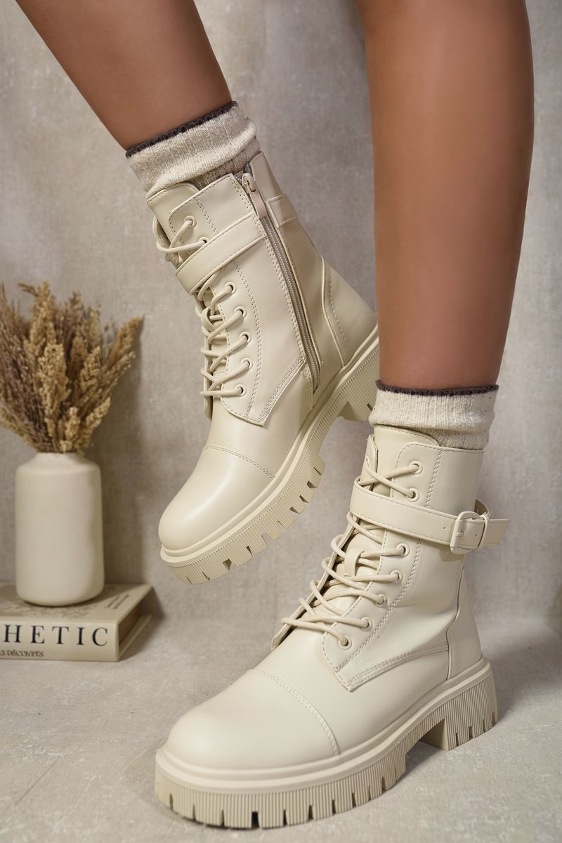 Kenike beige lace-up buckle chunky combat boots front view