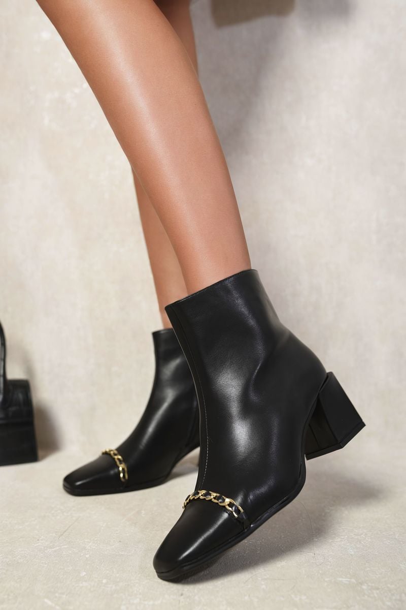 Kenike black two tone side zip block heel ankle boots front view