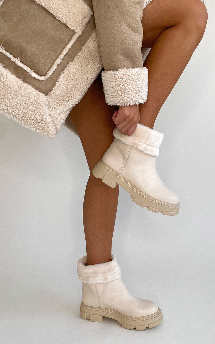 Kenike cream faux leather fluffy bow ankle boots front view