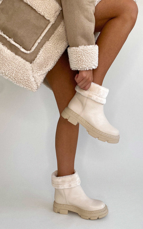 Kenike cream faux leather fluffy bow ankle boots front view
