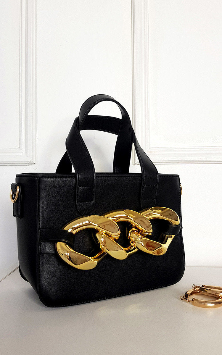 Kenike faux leather handbag with statement chain side view