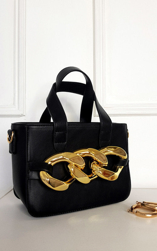 Kenike faux leather handbag with statement chain side view