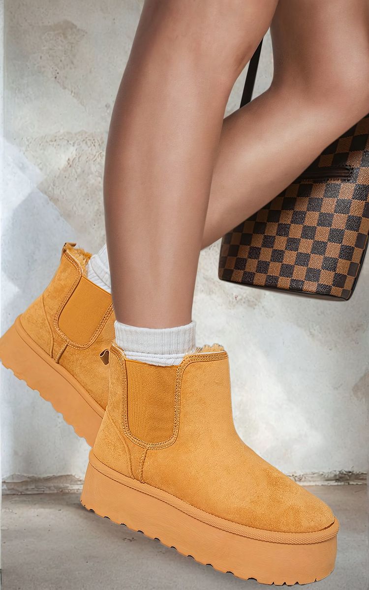 Kenike camel faux fur lined platform Chelsea boots front view