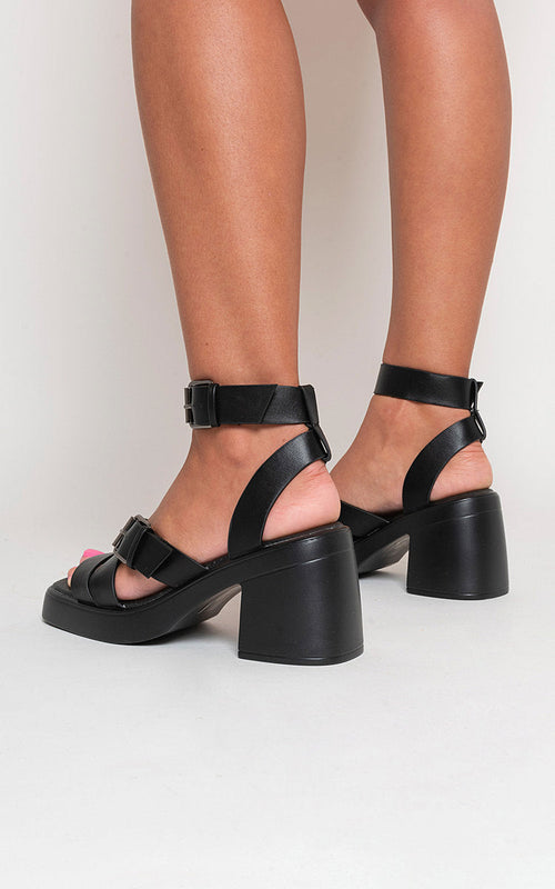 Kenike black criss-cross heeled sandals side profile