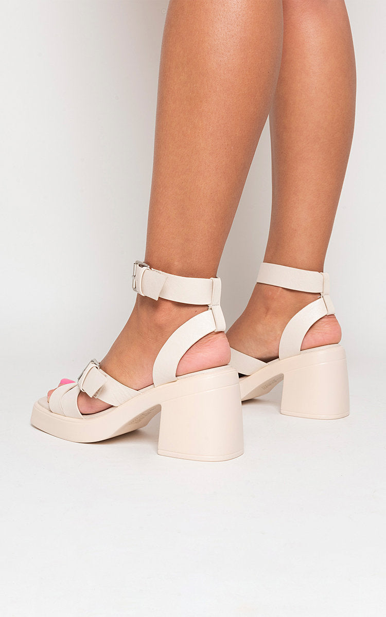 Kenike cream ankle strap heeled sandals criss-cross detail