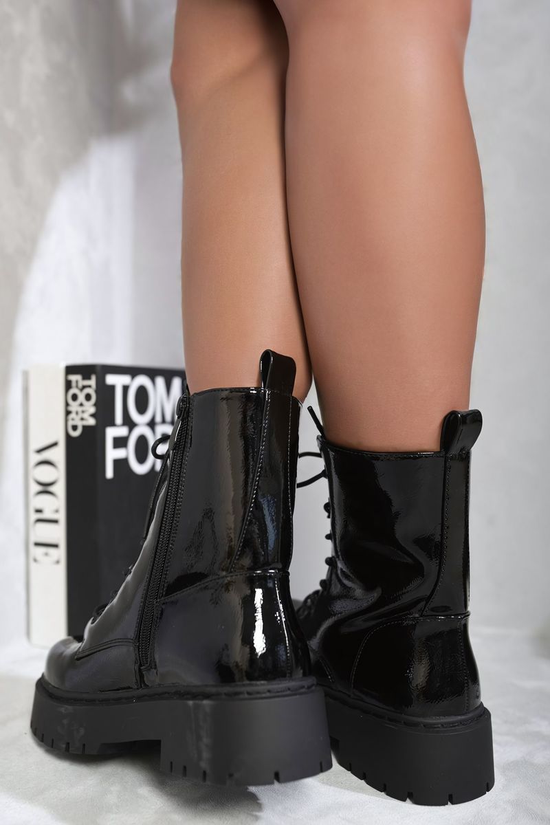 Kenike black patent chunky biker boots decor detail
