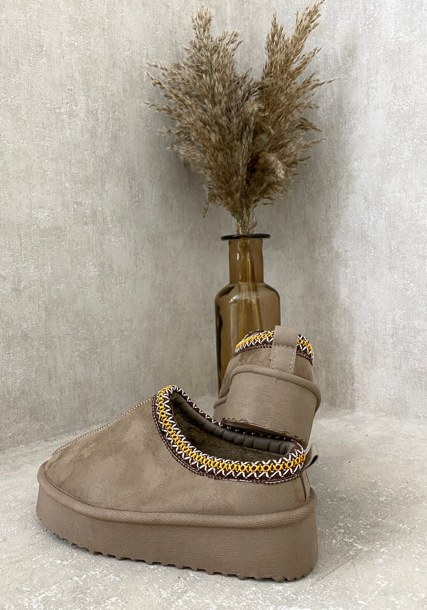 Kenike Aztec platform slipper boots worn on feet