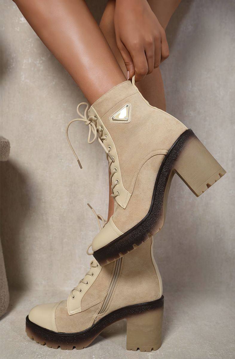 Kenike beige lace-up combat heeled ankle boots front view