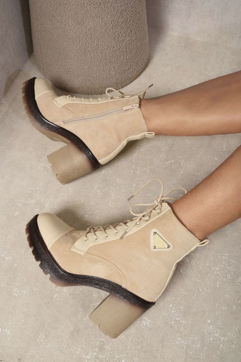 Kenike beige lace-up ankle boots heel detail