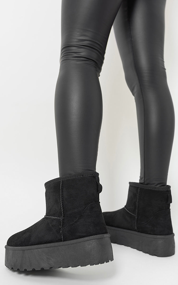 Kenike black platform boots thick heel side profile