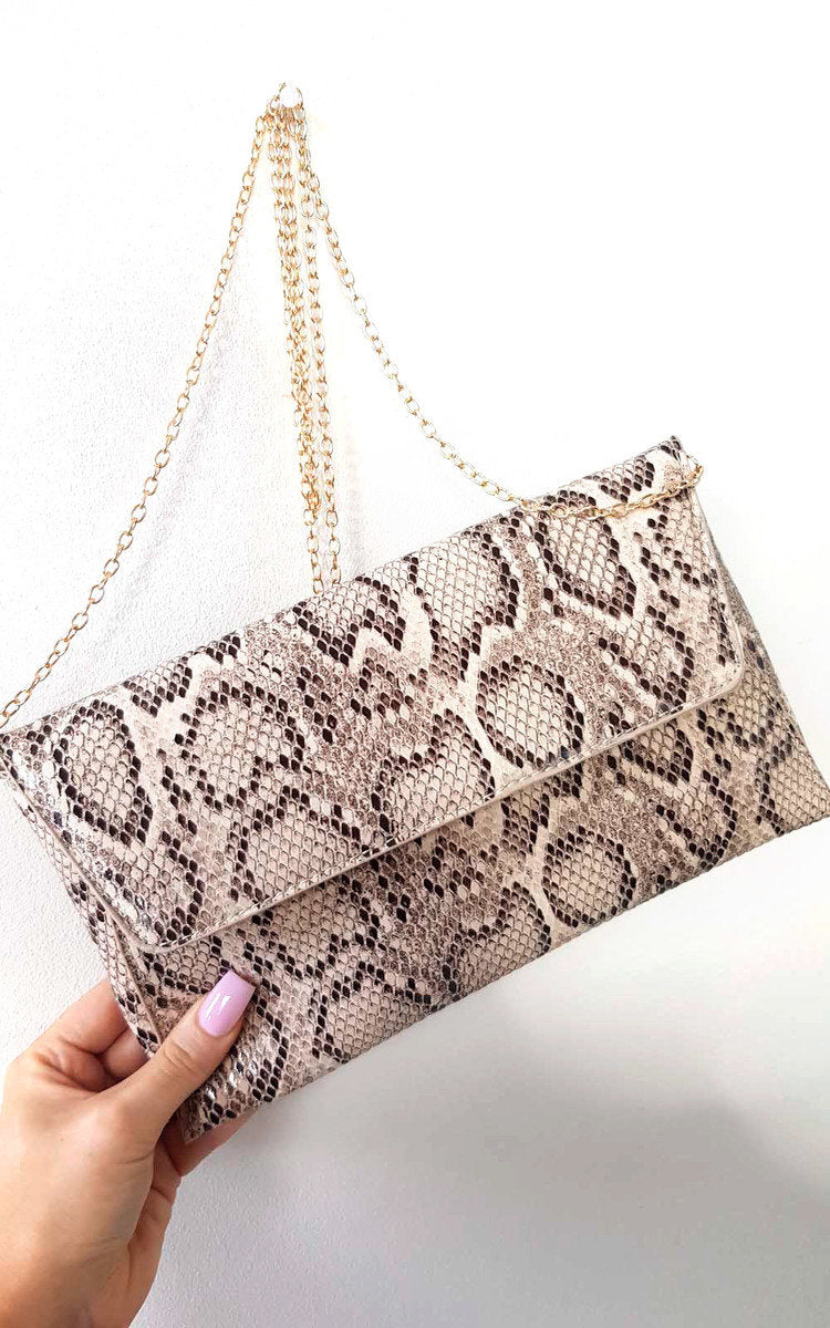 Kenike nude snake print envelope clutch bag front view