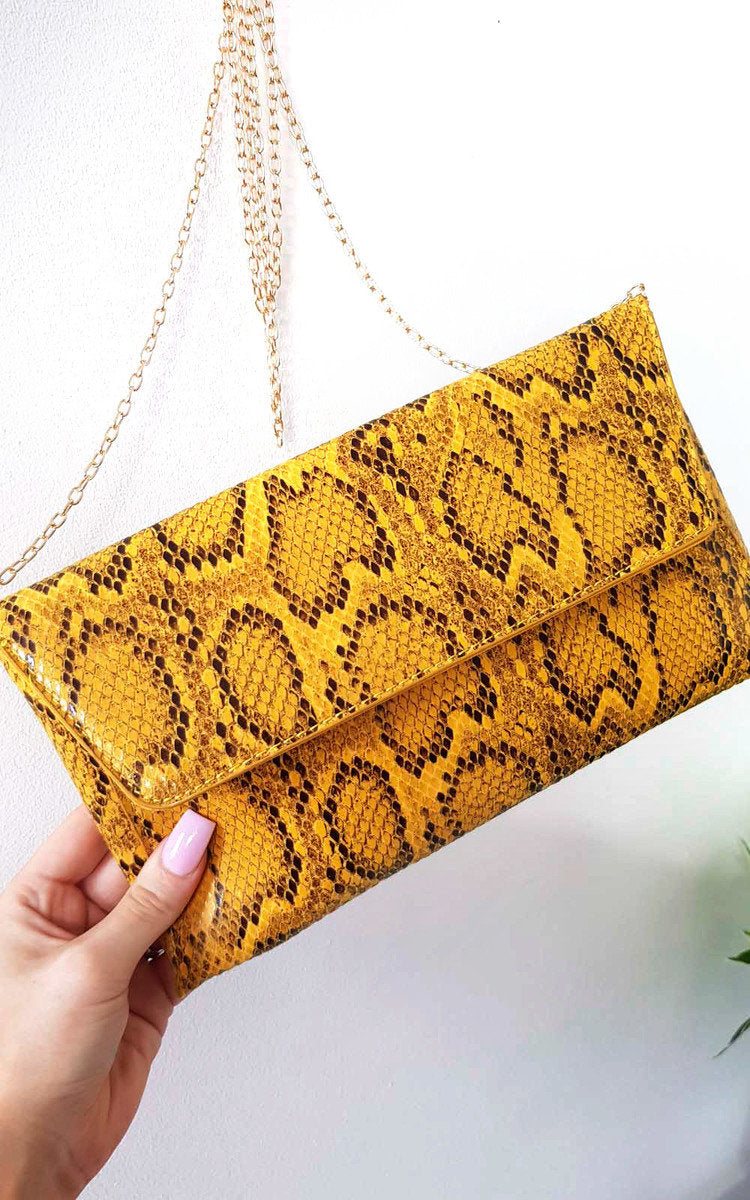 Kenike yellow snake print envelope clutch bag side detail