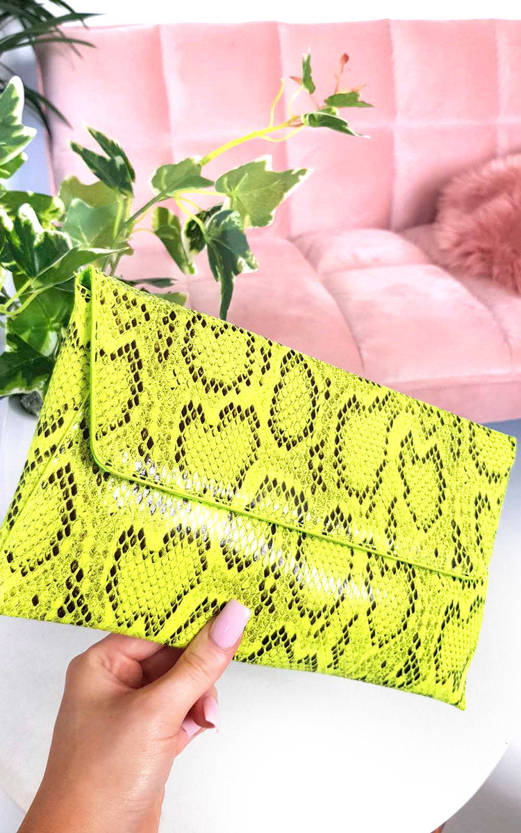 Kenike green snake print envelope clutch bag front view