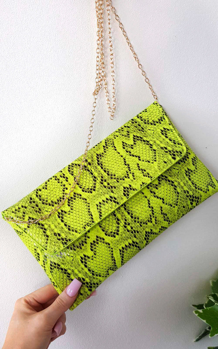Kenike green snake print envelope clutch bag detail view