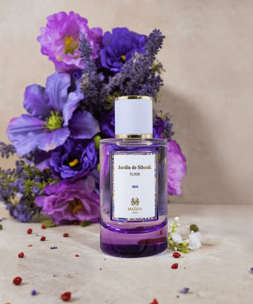 Maïssa Jardin de Sibenik perfume bottle with floral background