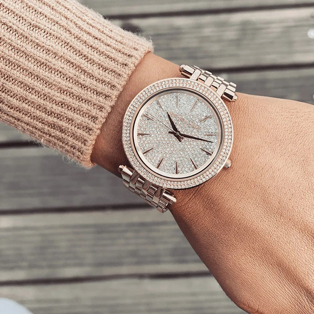 Michael Kors MK3439 rose gold watch on wrist close-up