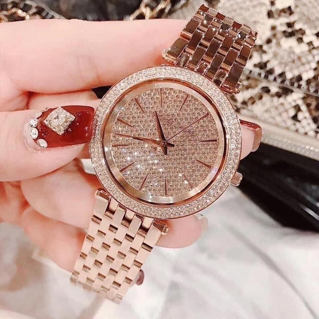 Michael Kors MK3439 women’s rose gold watch with detailed dial