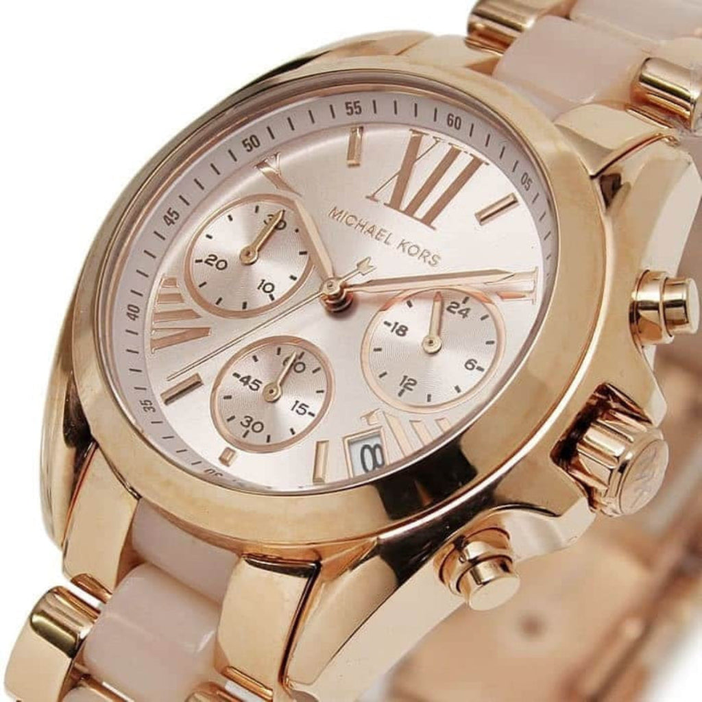 Michael Kors MK6066 gold dial close-up with rose gold case