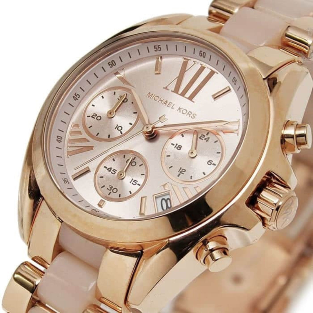 Michael Kors MK6066 gold dial close-up with rose gold case