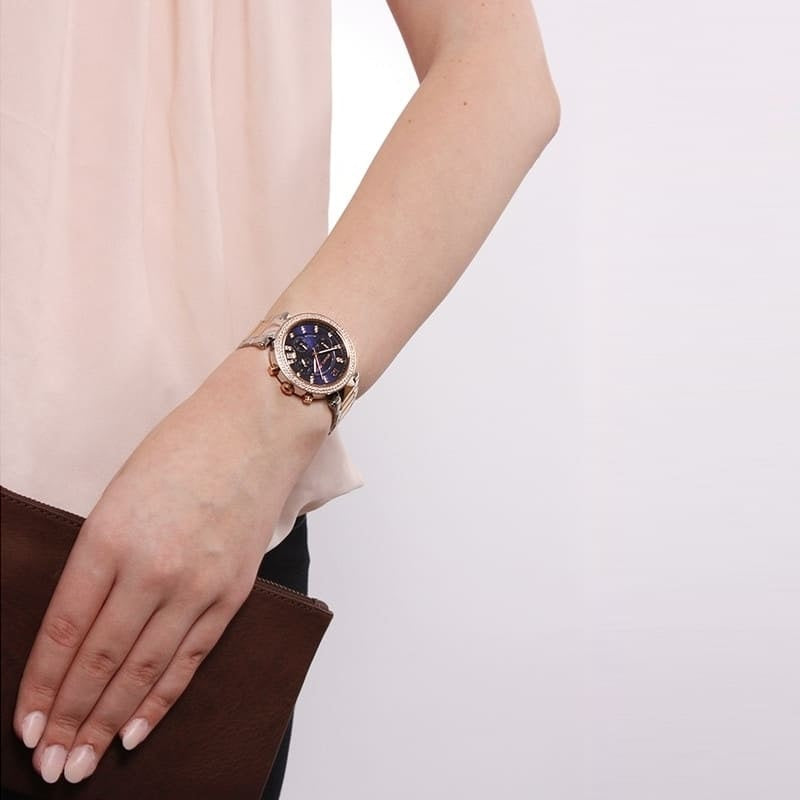 Michael Kors MK6141 Parker watch on wrist with blue dial and two-tone strap