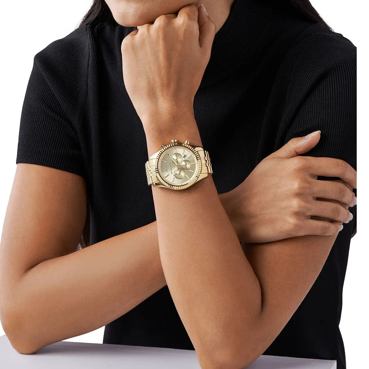 Michael Kors MK8281 Lexington watch on wrist with gold dial