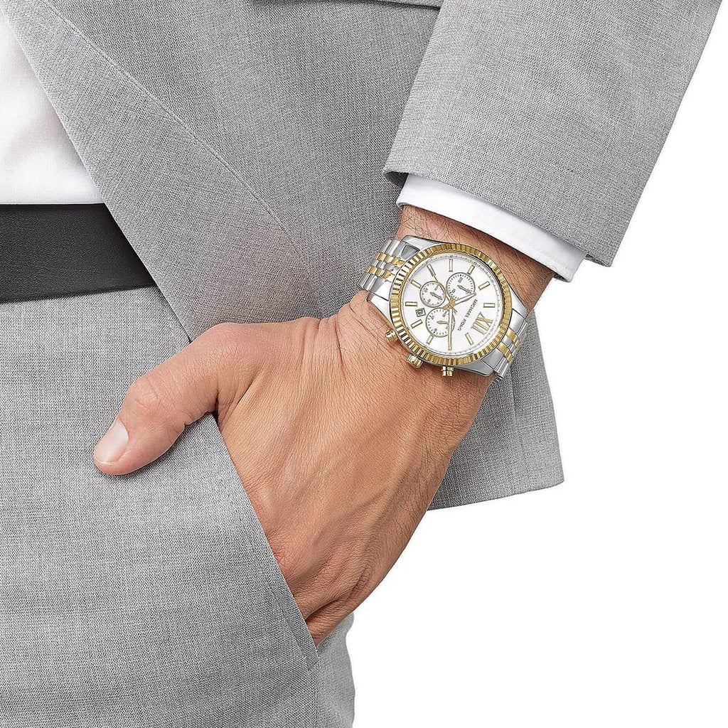 Michael Kors MK8344 Lexington watch on wrist with two-tone strap and silver dial