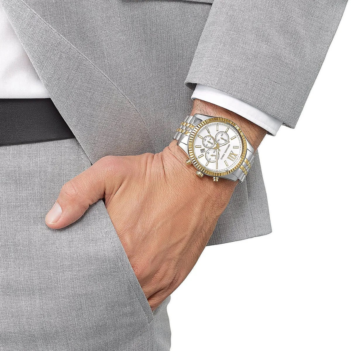 Michael Kors MK8344 Lexington watch on wrist with two-tone strap and silver dial
