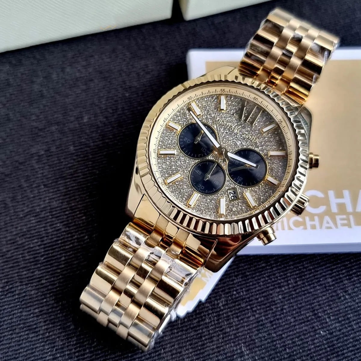 Michael Kors MK8494 angled view with gold dial and gold strap