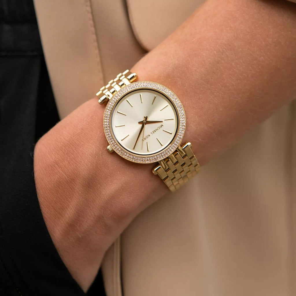 Michael Kors MK3191 gold dial watch close-up on wrist
