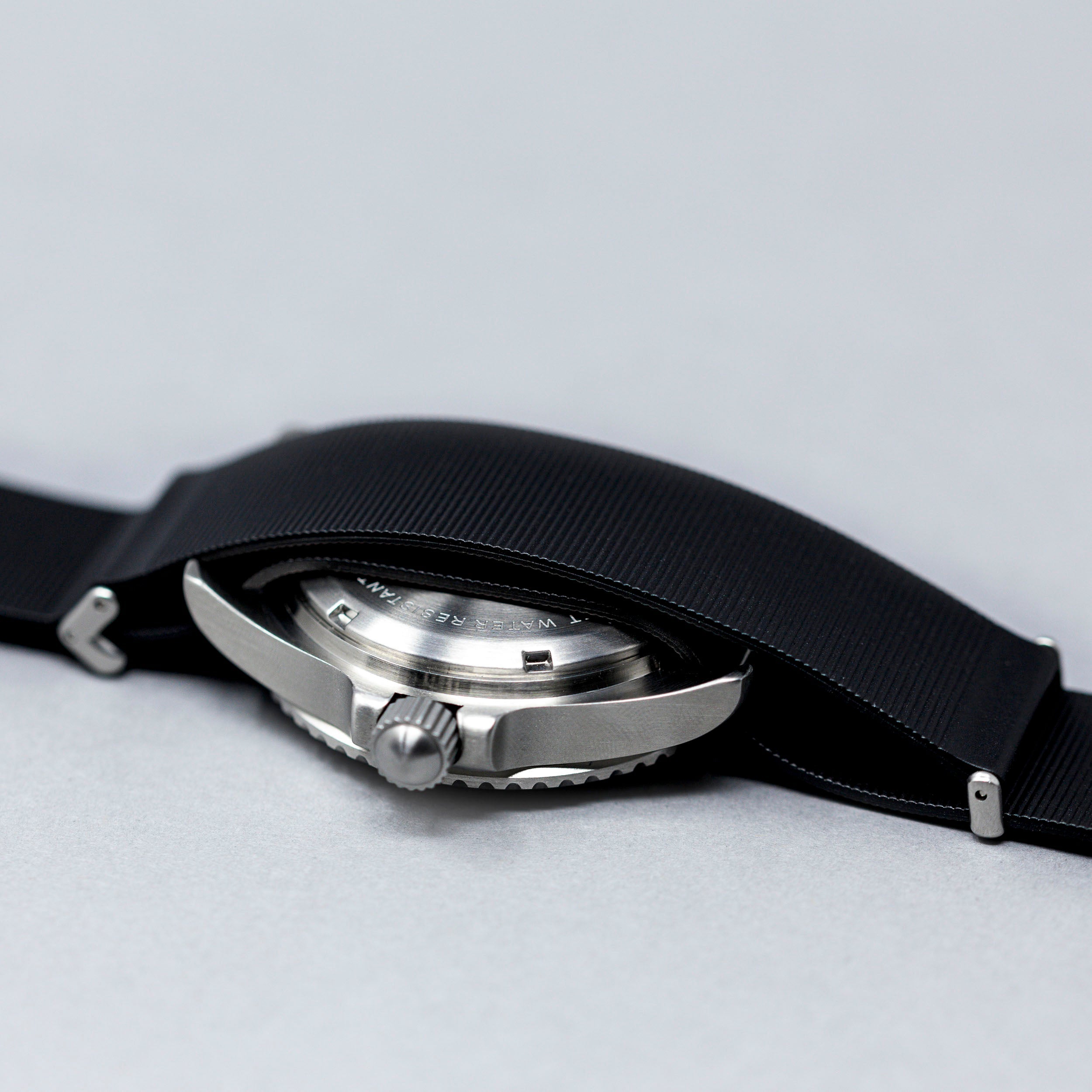 Rotate North black rubber strap detail